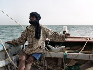 Le Patron à la barre